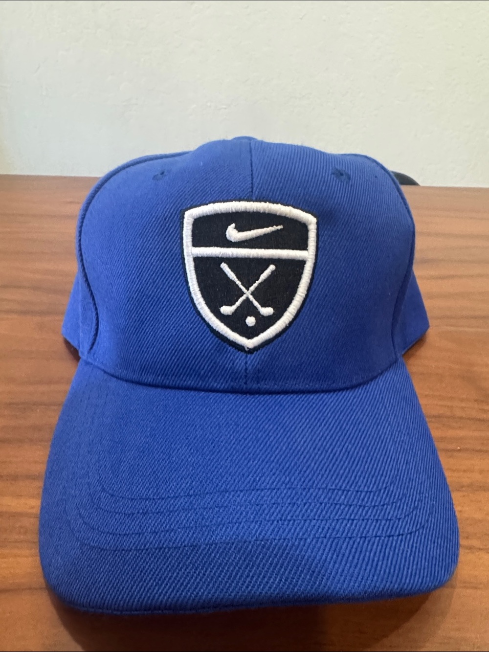 Nike Men’s Royal Blue Golf Cap with Black & White Shield Logo